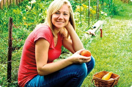 Woman, living with factor XIII A-subunit deficiency, sitting next to her garden